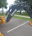 2015 John Deere 410L backhoe
