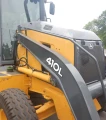 2015 John Deere 410L backhoe