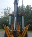 2015 John Deere 410L backhoe