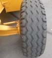 2015 John Deere 410L backhoe