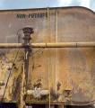 2000 Caterpillar D300E Series II water wagon