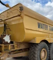 2000 Caterpillar D300E Series II water wagon