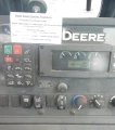 2015 John Deere 410L backhoe
