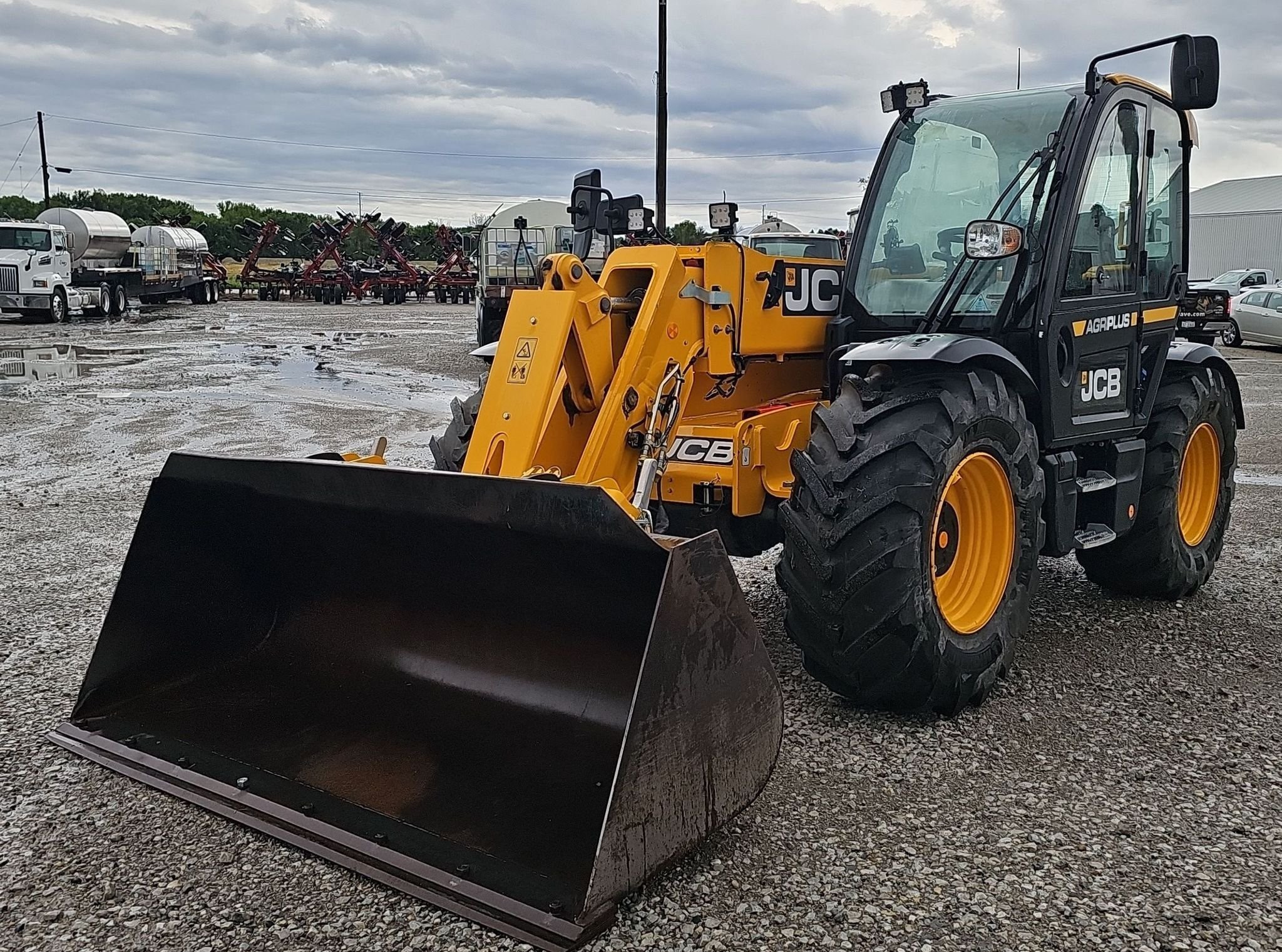 gallery 2023 JCB 542-70AG telehandler
