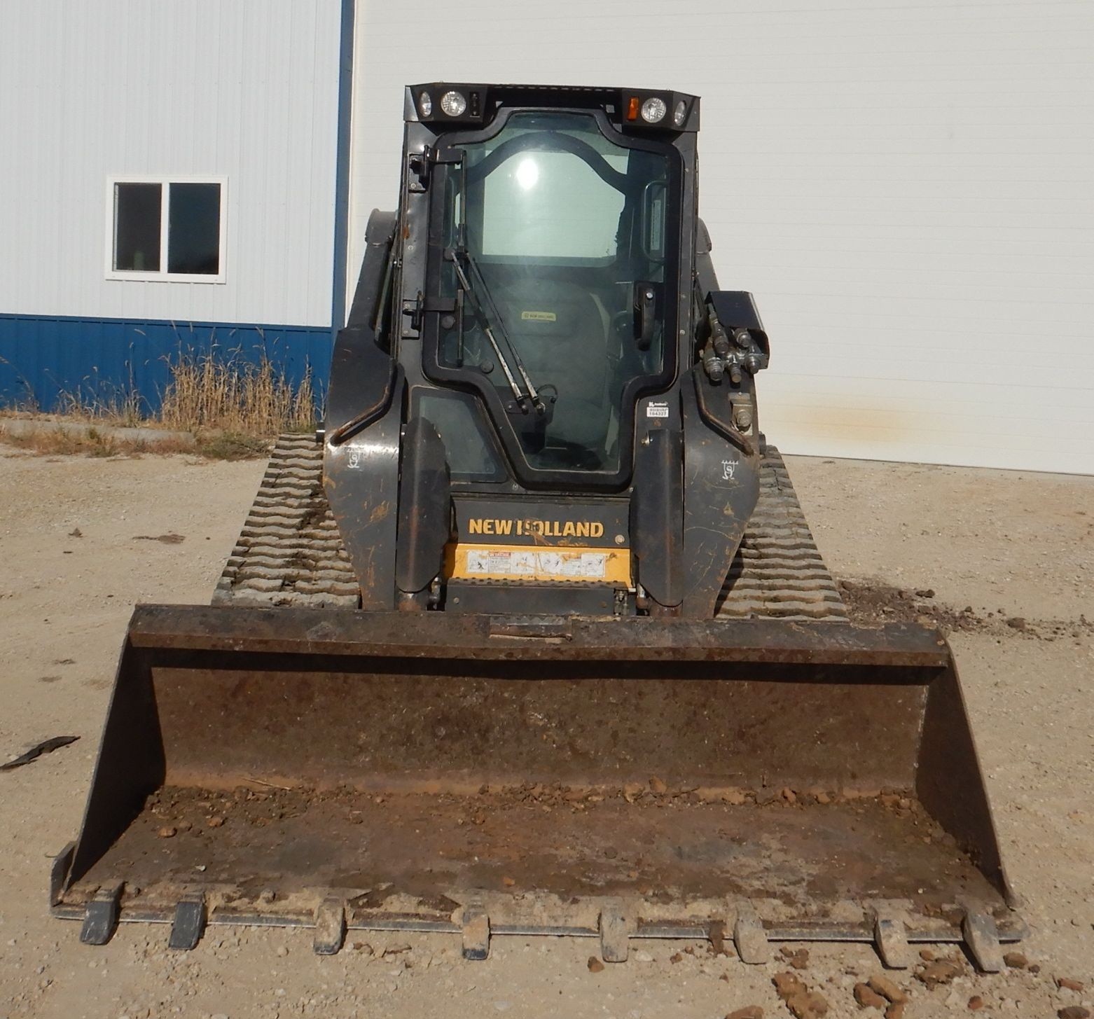 gallery New Holland C245 tracked skid steer loader