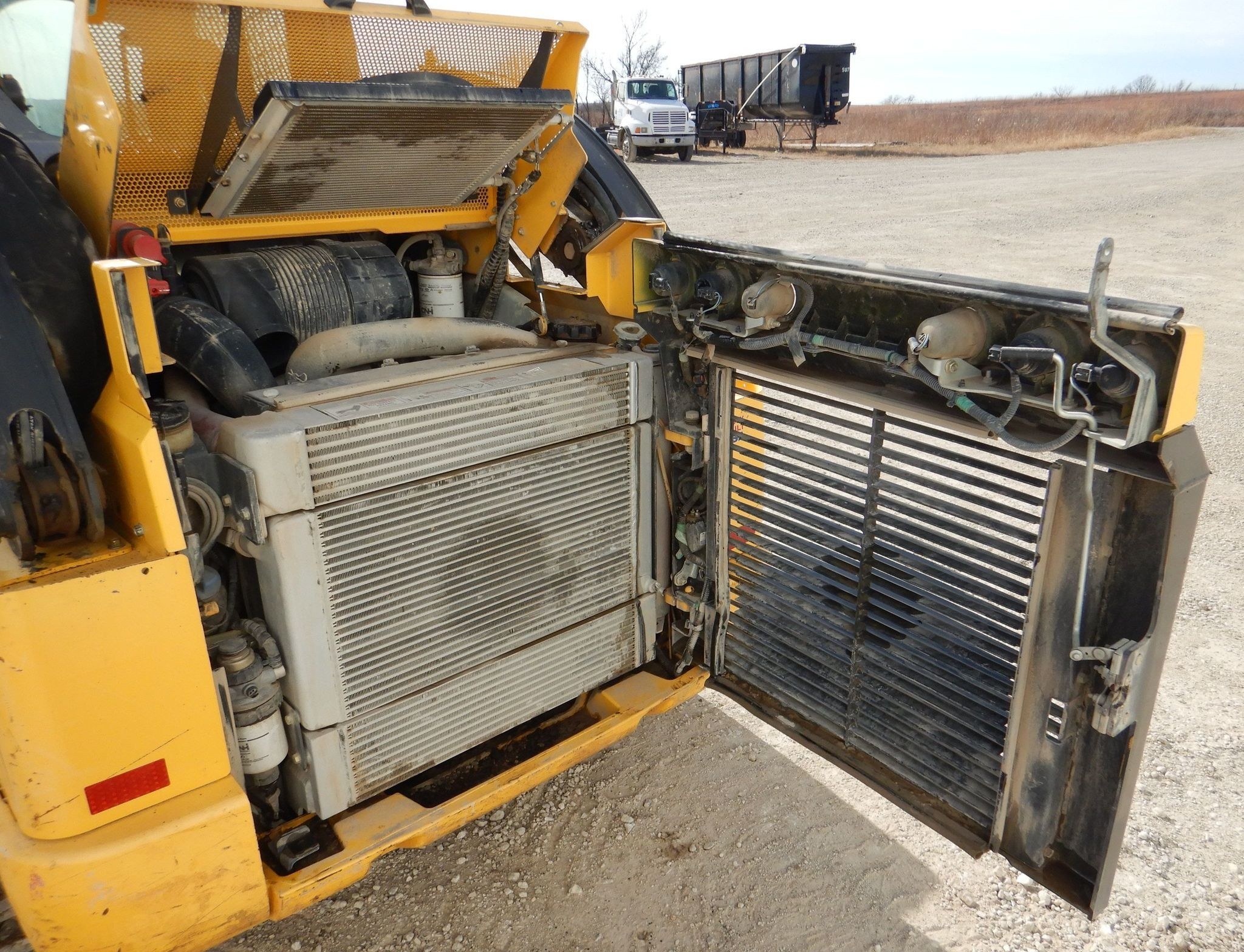 gallery New Holland C245 tracked skid steer loader