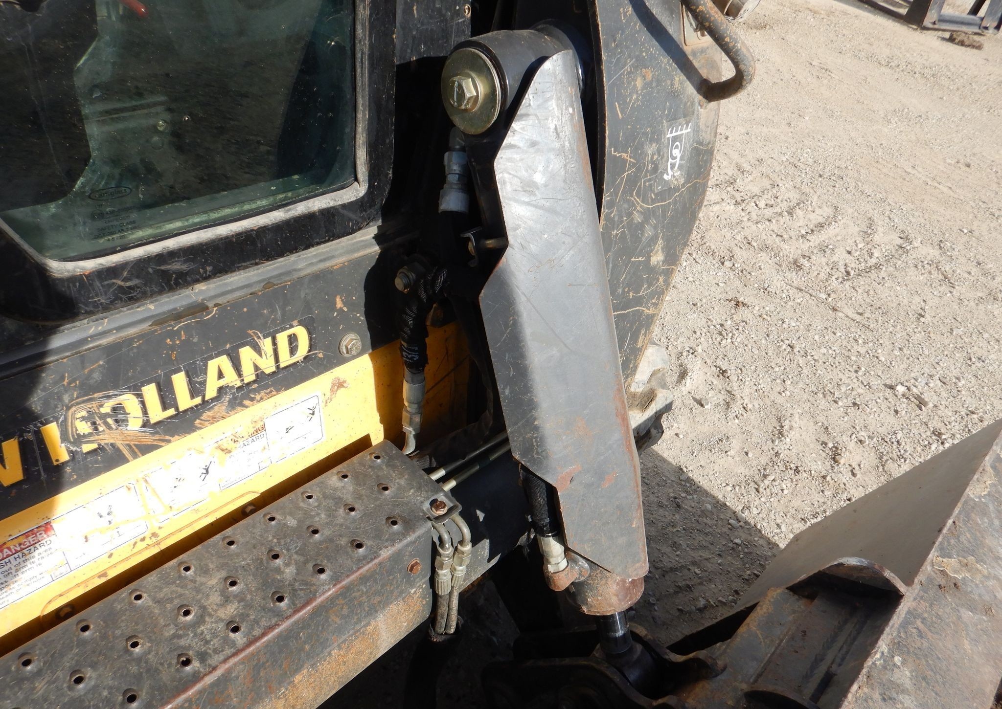 gallery New Holland C245 tracked skid steer loader