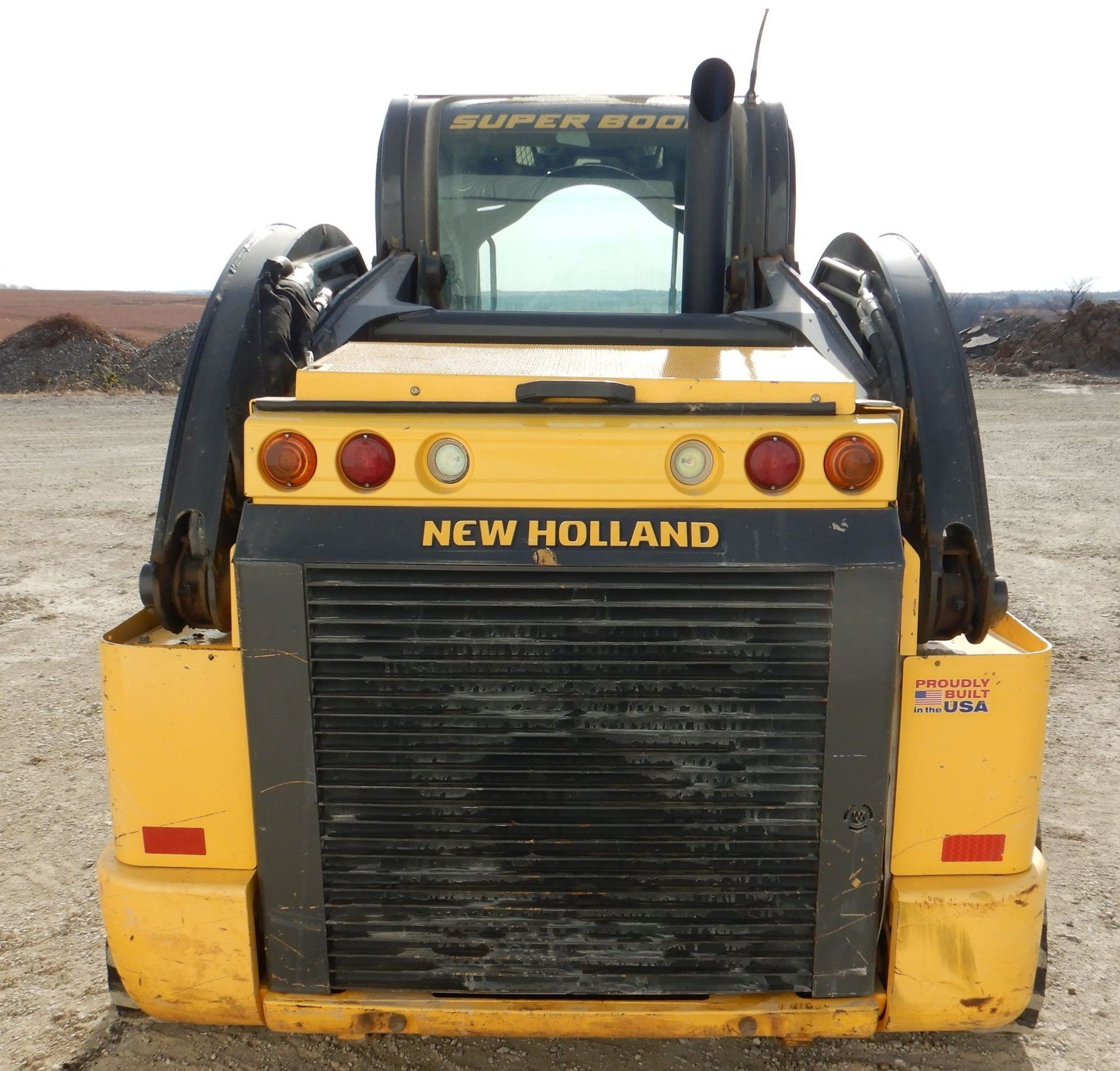 gallery New Holland C245 tracked skid steer loader