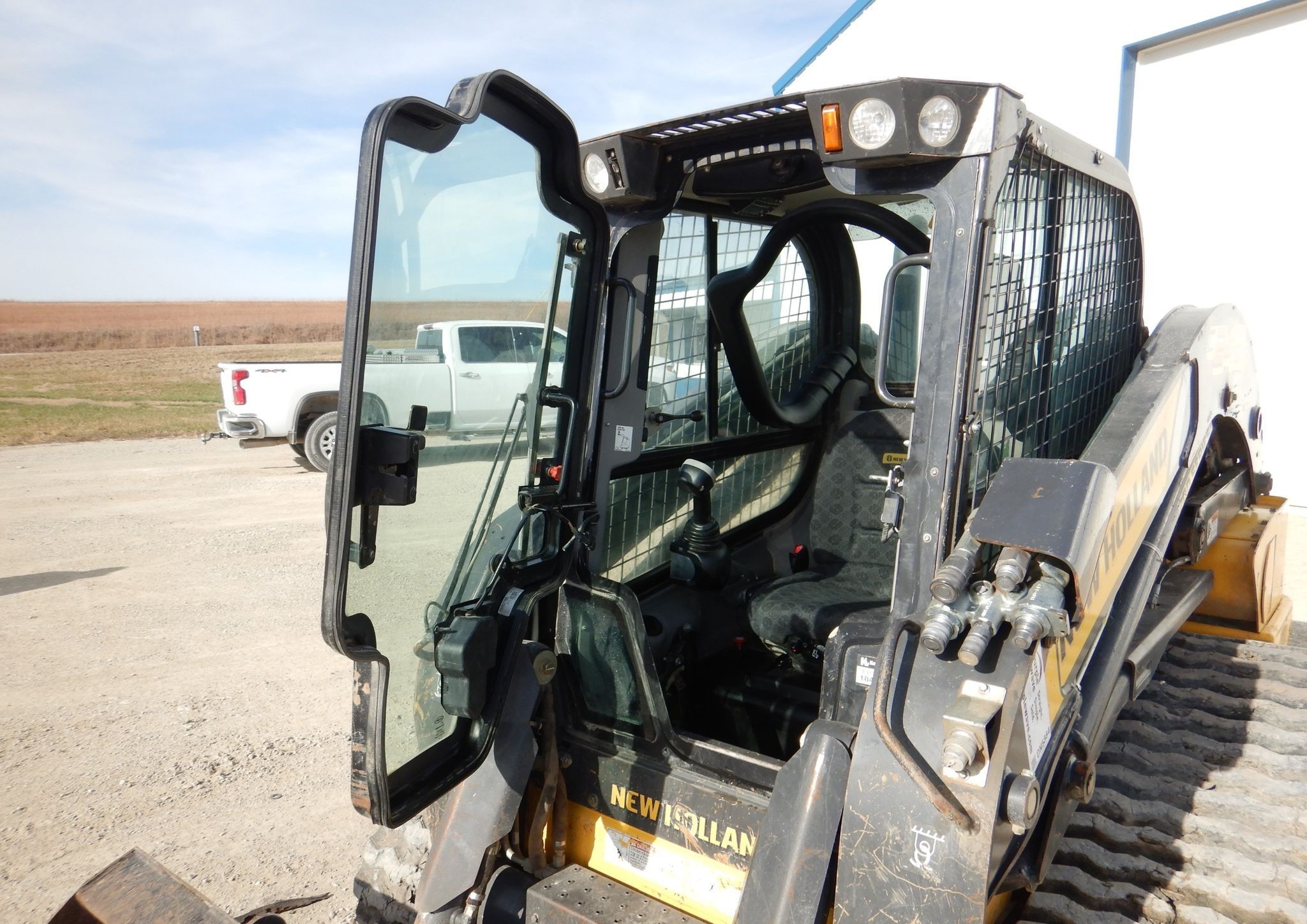 gallery New Holland C245 tracked skid steer loader