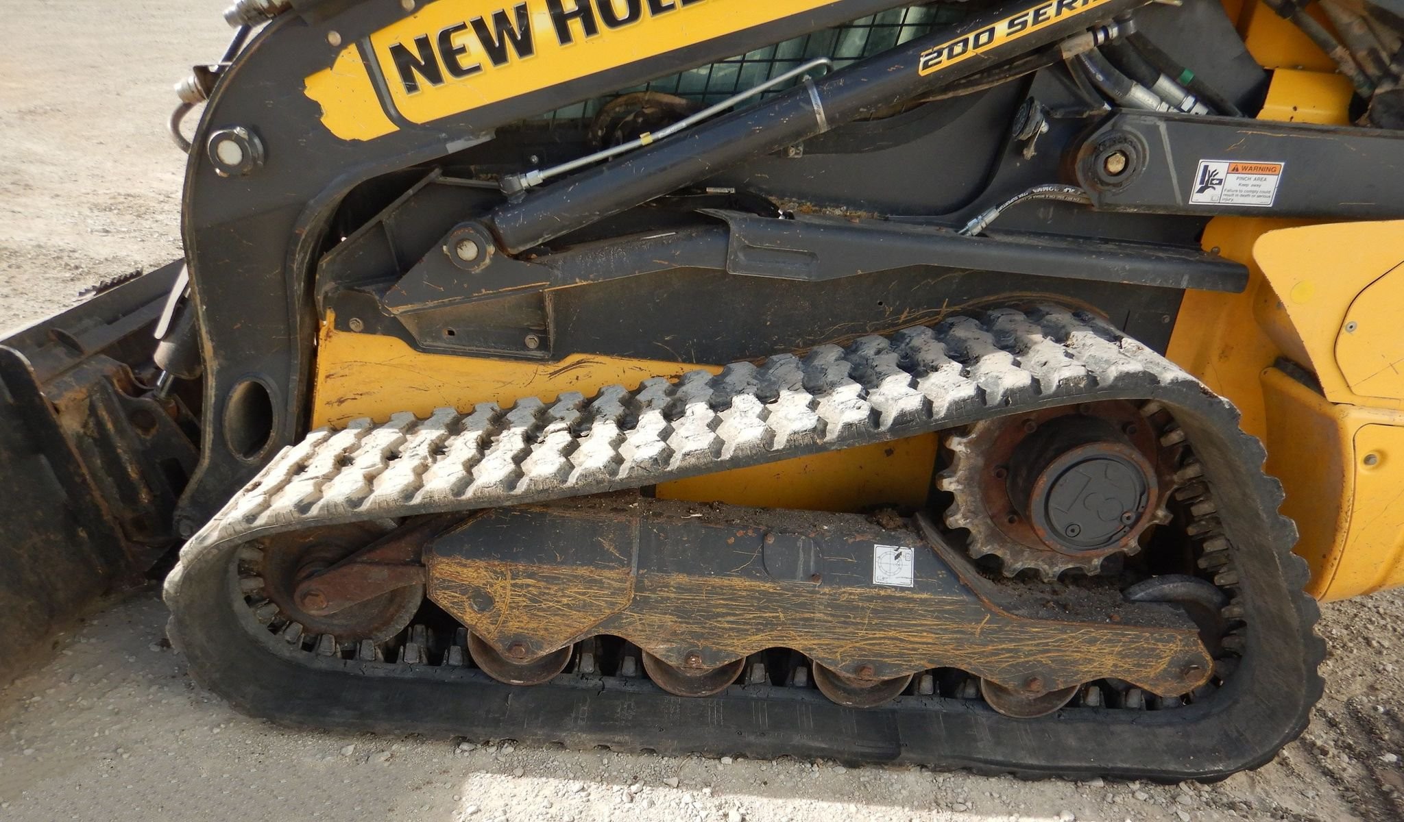 gallery New Holland C245 tracked skid steer loader