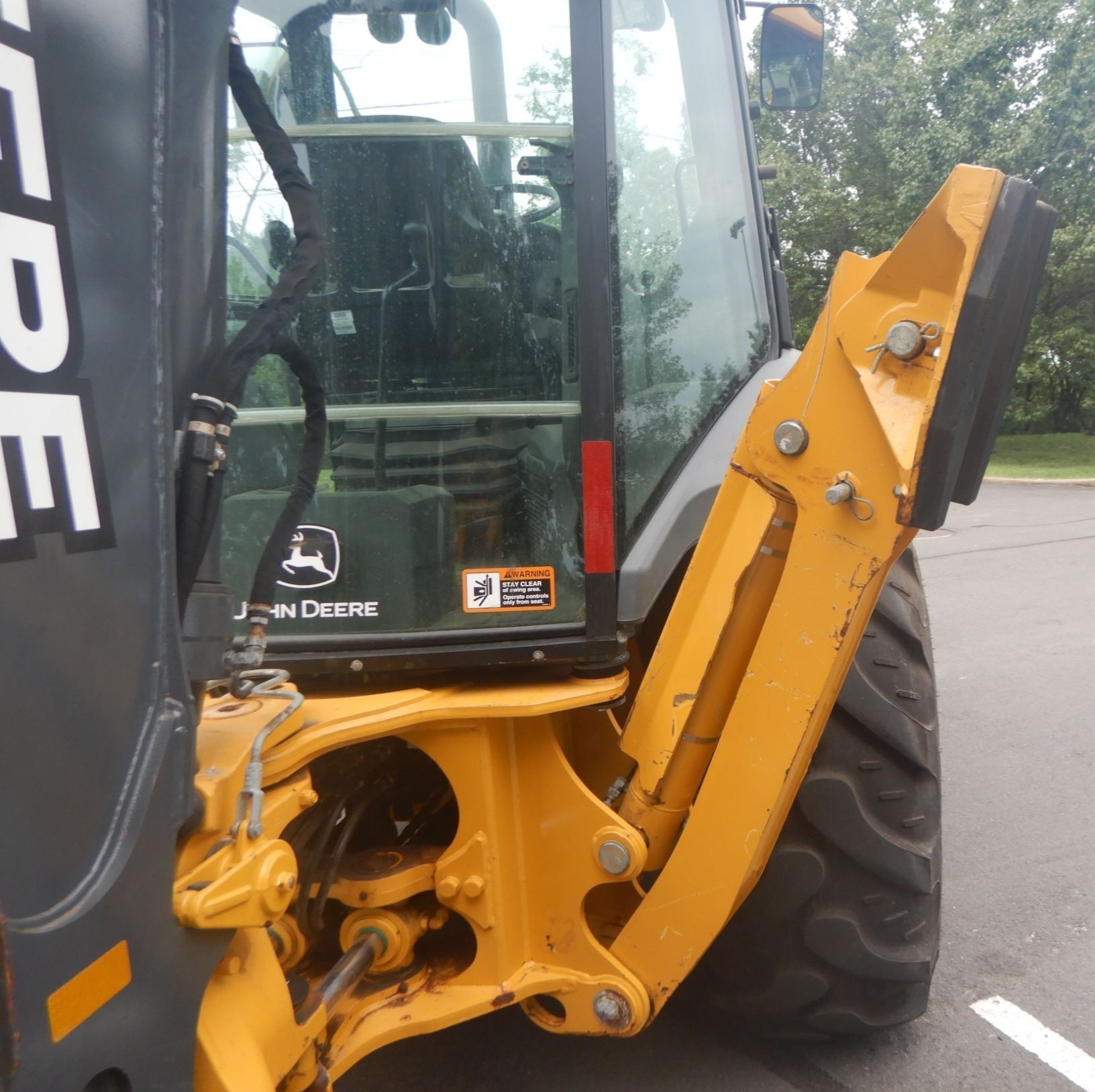 gallery 2015 John Deere 410L backhoe