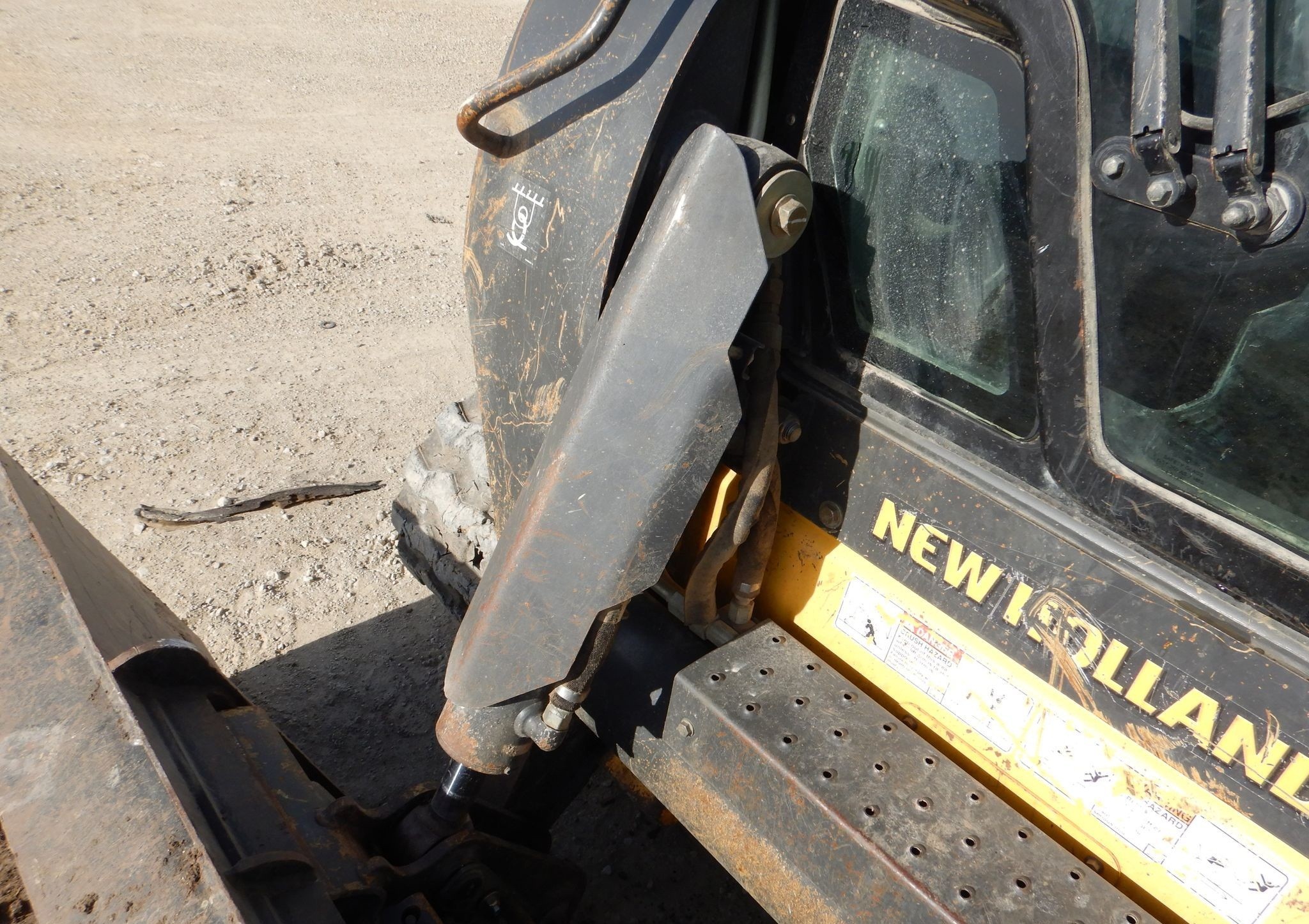 gallery New Holland C245 tracked skid steer loader