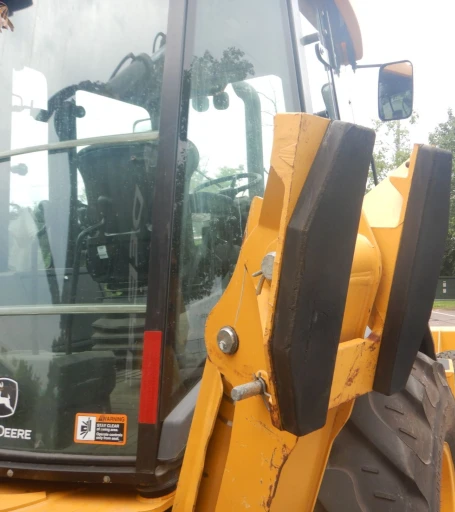 2015 John Deere 410L backhoe
