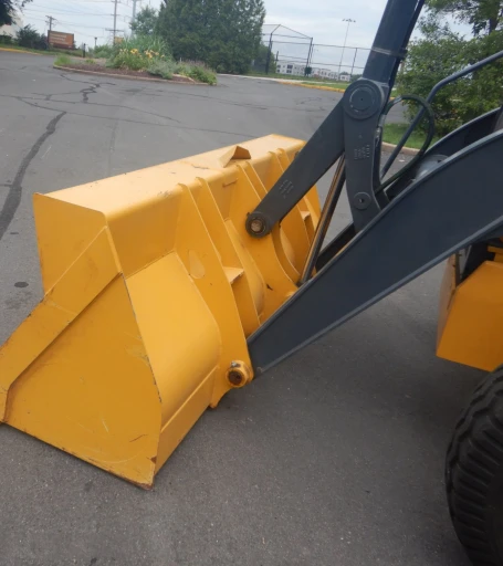 2015 John Deere 410L backhoe