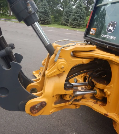 2015 John Deere 410L backhoe