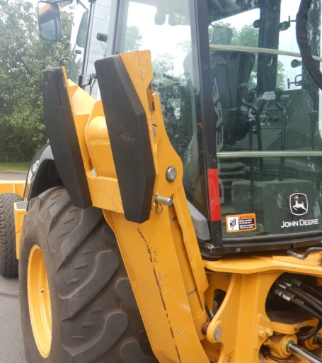 2015 John Deere 410L backhoe