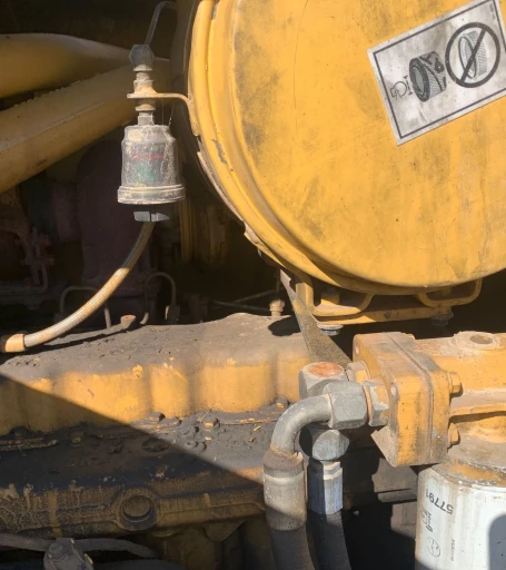 2001 Caterpillar 140H motor grader