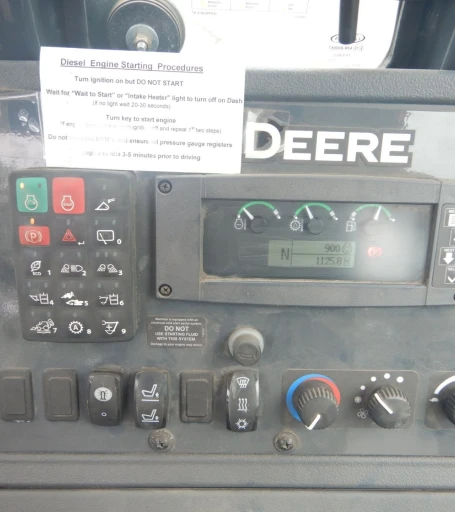 2015 John Deere 410L backhoe