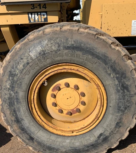 2001 Caterpillar 140H motor grader