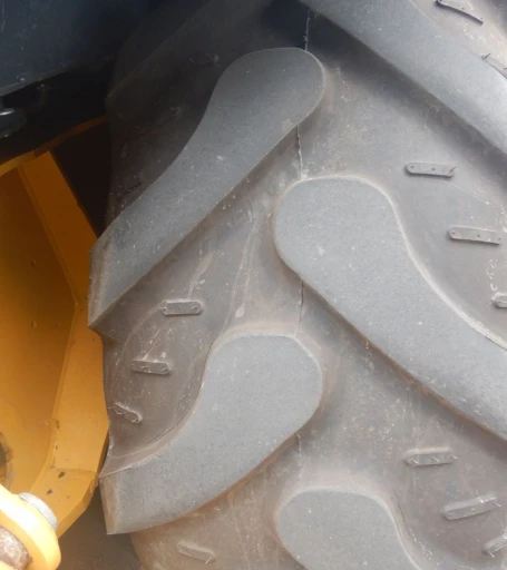 2015 John Deere 410L backhoe