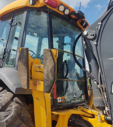 2018 John Deere 410L backhoe