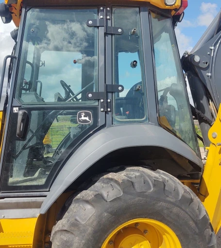 2018 John Deere 410L backhoe