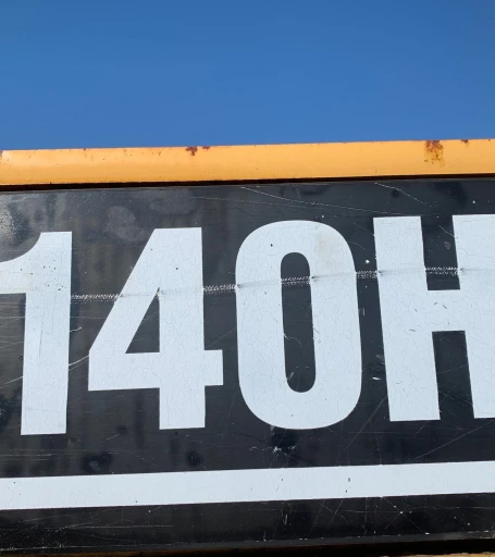 2001 Caterpillar 140H motor grader