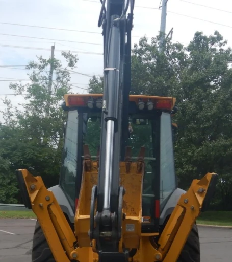 2015 John Deere 410L backhoe