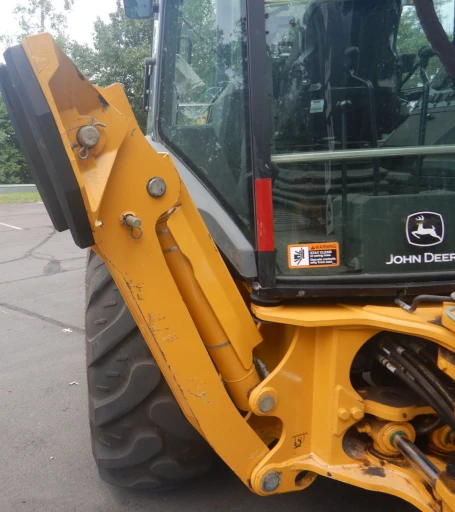 2015 John Deere 410L backhoe
