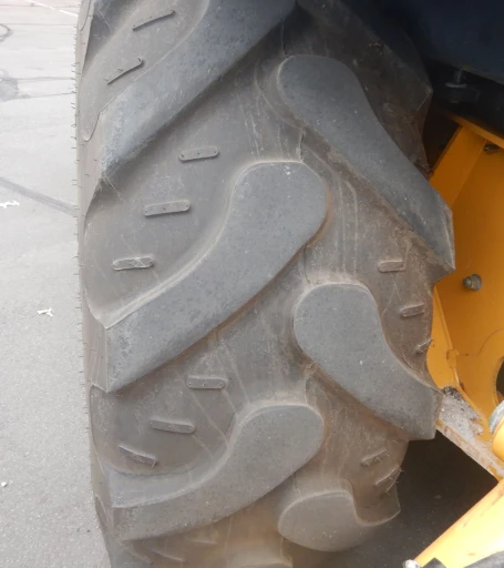 2015 John Deere 410L backhoe