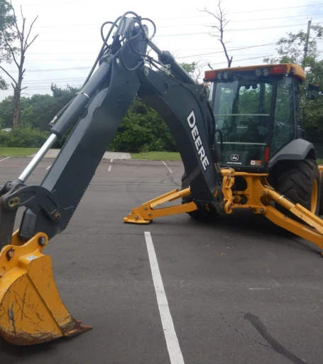 2015 John Deere 410L backhoe