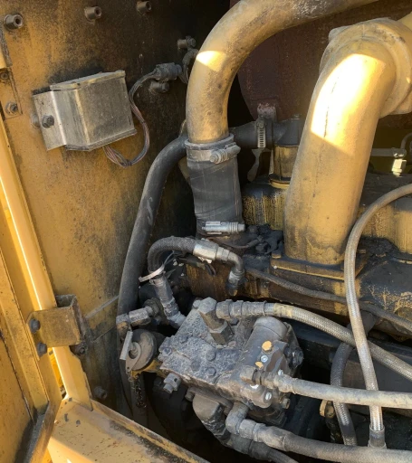 2001 Caterpillar 140H motor grader