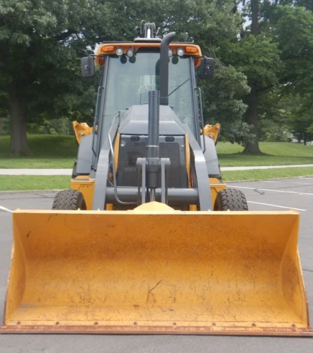 2015 John Deere 410L backhoe