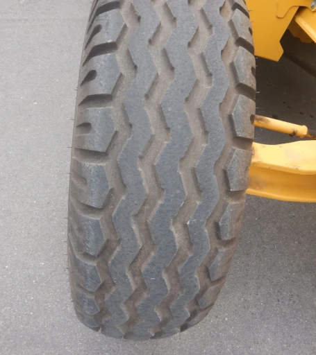 2015 John Deere 410L backhoe