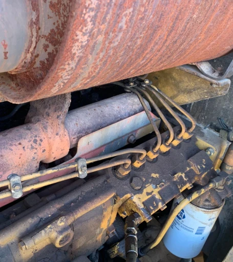 2001 Caterpillar 140H motor grader