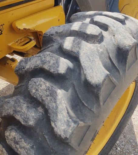 2018 John Deere 410L backhoe
