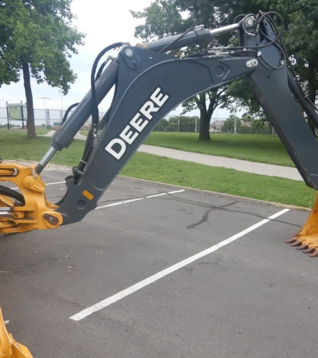 2015 John Deere 410L backhoe