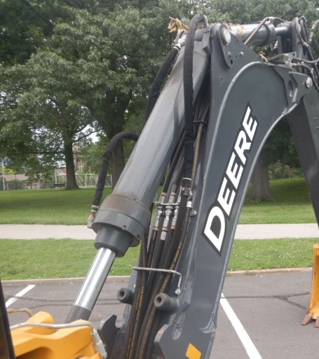 2015 John Deere 410L backhoe